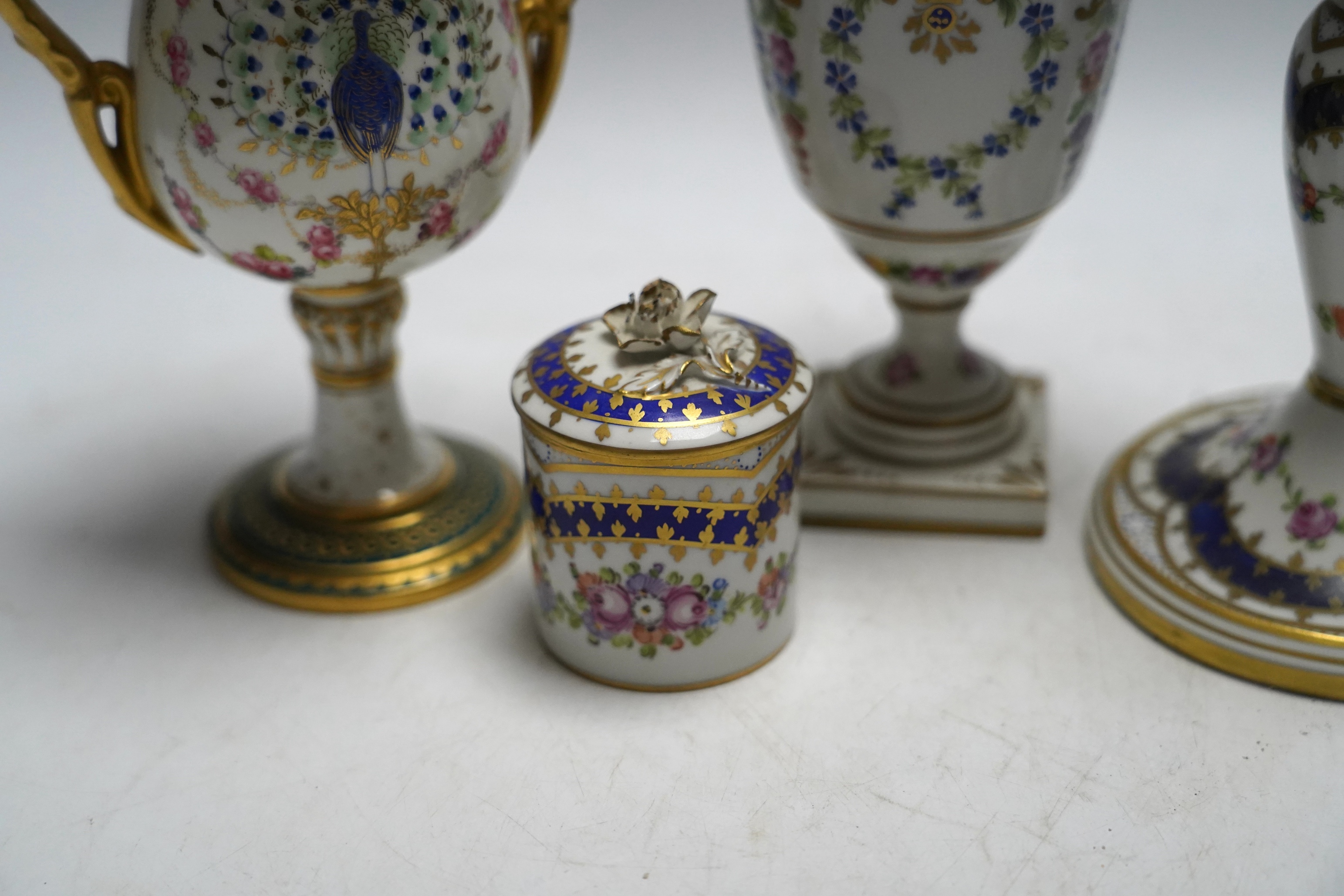 Three pairs of Dresden decorative porcelain items and a pair of Royal Crown Derby ‘Peacock’ urns, tallest 20cm (8)